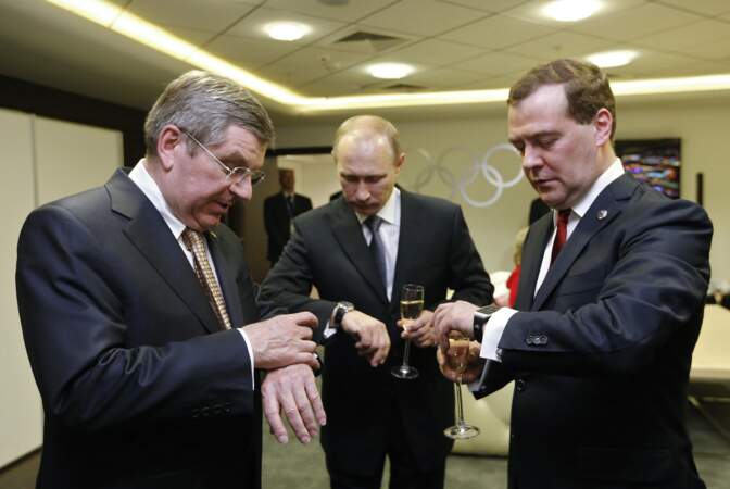 Vladimir Poutine, Thomas Bach et Dmitri Medvedev avant la cérémonie de clôture